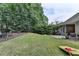 Spacious backyard featuring lush lawn perfect for outdoor activities and entertaining at 1635 Lake Heights Cir, Dacula, GA 30019