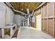 Unfinished basement showing plumbing, utility connections, and framing details at 4685 Braselton Hwy, Hoschton, GA 30548