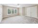 Neutral bedroom with carpeting and windows for great natural light at 4685 Braselton Hwy, Hoschton, GA 30548