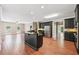 Modern kitchen with stainless steel appliances and a granite countertop island at 4685 Braselton Hwy, Hoschton, GA 30548