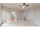 Spacious bedroom with double closets, ceiling fan, and neutral walls at 1605 Spinnaker Drive, Alpharetta, GA 30005