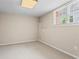 Bedroom with carpet and a window at 1605 Spinnaker Drive, Alpharetta, GA 30005