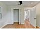 Bedroom featuring wood flooring, closet with bi-fold doors, and a ceiling fan at 3991 Adamsville Sw Dr, Atlanta, GA 30331