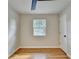 Inviting bedroom with hardwood floors, natural light, and a ceiling fan at 3991 Adamsville Sw Dr, Atlanta, GA 30331