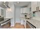 Close-up of the kitchen featuring modern stainless steel appliances and granite countertops at 3991 Adamsville Sw Dr, Atlanta, GA 30331