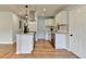 Bright kitchen featuring granite countertops, white cabinetry, and stainless steel appliances at 3991 Adamsville Sw Dr, Atlanta, GA 30331