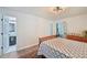 Bedroom featuring hardwood floors, neutral paint, and natural light at 5077 Martindale Ln, Stone Mountain, GA 30088