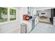 Renovated kitchen with granite countertops, stainless steel appliances, and backyard view at 5077 Martindale Ln, Stone Mountain, GA 30088