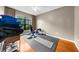 Bright bedroom featuring a ceiling fan, large windows, and hardwood floors at 5300 Peachtree Rd # 1608, Chamblee, GA 30341