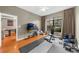 Bright bedroom featuring a large window, hardwood floors, and neutral paint at 5300 Peachtree Rd # 1608, Chamblee, GA 30341