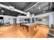 Spacious clubhouse with a pool table, lounge area, and kitchen in a modern, industrial design at 5300 Peachtree Rd # 1608, Chamblee, GA 30341