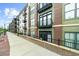 Apartment complex featuring balconies, brick and composite siding, and wrought iron at 5300 Peachtree Rd # 1608, Chamblee, GA 30341
