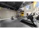 Well-equipped fitness center with treadmills, weights, and ample natural light at 5300 Peachtree Rd # 1608, Chamblee, GA 30341