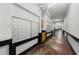Interior hallway with mailboxes, neutral walls, and concrete flooring at 5300 Peachtree Rd # 1608, Chamblee, GA 30341