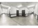 Well-lit hallway with multiple apartment doors, with a clean and modern design at 5300 Peachtree Rd # 1608, Chamblee, GA 30341