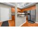 Well-lit kitchen features stainless appliances, granite countertops and ample cabinet space for storage at 5300 Peachtree Rd # 1608, Chamblee, GA 30341