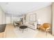 Bright living area with contemporary furnishings adjacent to a modern, well-equipped kitchen at 5300 Peachtree Rd # 1608, Chamblee, GA 30341