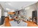 Inviting living area showcasing a blend of comfort and style, complemented by a well-appointed kitchen in the background at 5300 Peachtree Rd # 1608, Chamblee, GA 30341