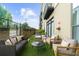 Cozy outdoor patio area furnished with a sofa, chairs, and a table, perfect for relaxing and entertaining at 5300 Peachtree Rd # 1608, Chamblee, GA 30341