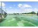 Well-maintained tennis court for recreational play with surrounding greenery at 5300 Peachtree Rd # 1608, Chamblee, GA 30341