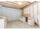 Basement area with exposed ceiling and unfinished cabinetry at 1122 Cayuga Ct, Dacula, GA 30019