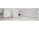 Finished basement area with access to stairs and a bonus room at 1122 Cayuga Ct, Dacula, GA 30019