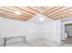 Unfinished basement features exposed ceiling and white painted drywall at 1122 Cayuga Ct, Dacula, GA 30019