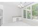 Dining area filled with natural light, a built-in desk and a view to the exterior at 1122 Cayuga Ct, Dacula, GA 30019