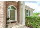 Close-up of a front door with stone accents and landscaped entrance at 1122 Cayuga Ct, Dacula, GA 30019