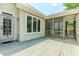 Outdoor area featuring a screened porch and open deck space for relaxing and entertaining at 1122 Cayuga Ct, Dacula, GA 30019