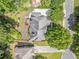 Birds-eye view of the home with a beautiful backyard and mature trees at 3438 Winborn Walk Northwest Nw, Kennesaw, GA 30152