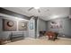 Finished basement game room with a dart board, foosball table, and grey walls at 3438 Winborn Walk Northwest Nw, Kennesaw, GA 30152