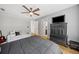 Bedroom offers hardwood floors, a ceiling fan, and grey walls at 3438 Winborn Walk Northwest Nw, Kennesaw, GA 30152