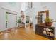 Bright foyer with hardwood floors, high ceilings, and elegant decor, creating a welcoming entrance at 3438 Winborn Walk Northwest Nw, Kennesaw, GA 30152