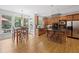 Bright kitchen with wood cabinets, hardwood floors, and stainless steel refrigerator at 3438 Winborn Walk Northwest Nw, Kennesaw, GA 30152