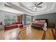 Large main bedroom with decorative ceiling and hardwood floor at 3438 Winborn Walk Northwest Nw, Kennesaw, GA 30152