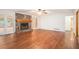 Spacious living room showcasing a stone fireplace, hardwood floors, and natural light at 1488 White Columns Blvd, Canton, GA 30115