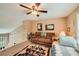 Spacious bedroom features a comfy daybed, plush sofa, and colorful area rug at 181 Weatherstone Dr, Woodstock, GA 30188