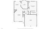 First floor plan showing kitchen, dining room, living room, and bedrooms at 181 Weatherstone Dr, Woodstock, GA 30188
