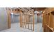Unfinished basement showing framing, duct work, and concrete walls at 5690 Rutland Trce, Lithonia, GA 30058