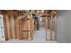 Partially framed basement featuring exposed ductwork, plumbing, and electrical, presenting an opportunity for personalization at 5690 Rutland Trce, Lithonia, GA 30058