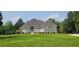 Charming one-story home features a well manicured lawn and a welcoming entrance at 5690 Rutland Trce, Lithonia, GA 30058