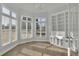 Inviting office space filled with natural light with a built-in bookcase and hardwood floors at 5690 Rutland Trce, Lithonia, GA 30058