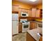 Kitchen with a white range, cabinetry and countertops at 1428 Orchard Park Dr, Stone Mountain, GA 30083