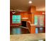 Inviting living space with a fireplace, wood floors, and a view to the outside at 1428 Orchard Park Dr, Stone Mountain, GA 30083