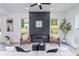 Bright living room featuring a fireplace and plush seating, perfect for relaxing and entertaining at 2312 Herring Sw Rd, Atlanta, GA 30311