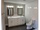 Elegant bathroom with a double sink vanity, subway tile walls, and a modern design at 2625 Semmes St, Atlanta, GA 30344