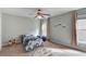 Cozy bedroom with carpet, natural light, and playful decor creating a warm and inviting space at 4092 Duran Ln, Auburn, GA 30011