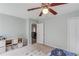 Calm bedroom with carpet, natural light, and storage units offers a peaceful and organized environment at 4092 Duran Ln, Auburn, GA 30011