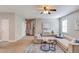 Open living room with carpet and a comfortable sectional sofa and decor at 4092 Duran Ln, Auburn, GA 30011